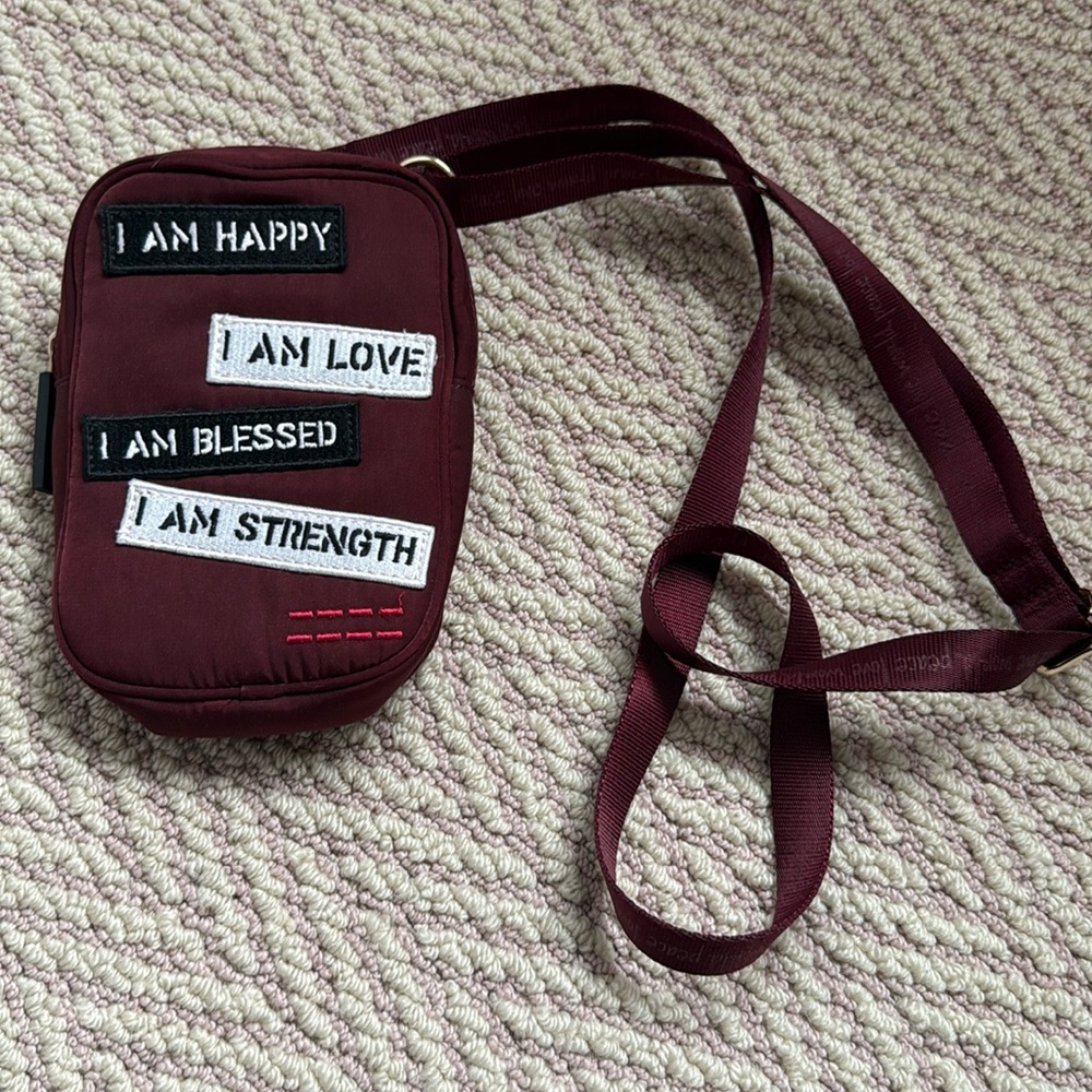 Peace Love World crossbody bag